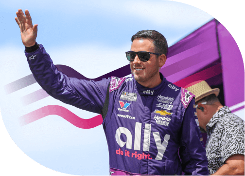 NASCAR driver of the Ally #48, Alex Bowman, wears his Ally fire suit and waves to the crowd before a race