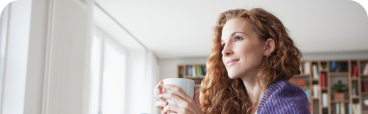 A person sipping coffee.