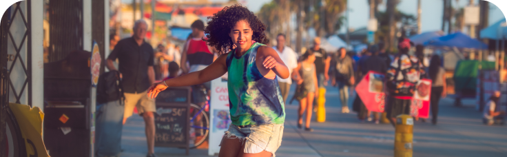 A young person skateboarding.